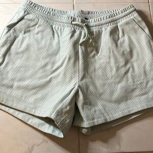 ONLY light teal lined shorts with pockets.  EUC!